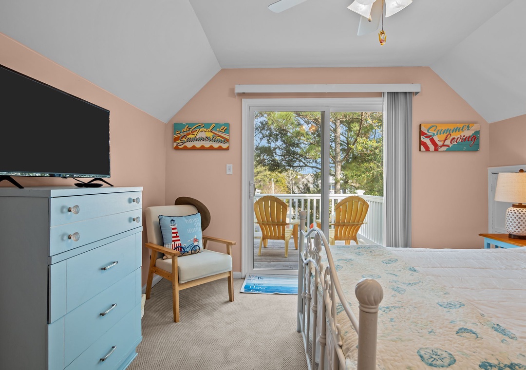Step into your peaceful bedroom retreat with coastal charm, where soft morning light and your private balcony await.