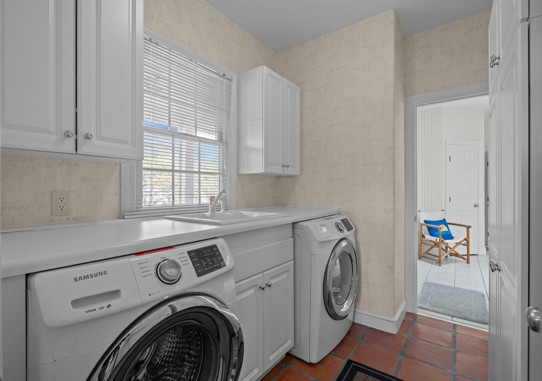 Laundry Room off the Kitchen and attached to Primary Suite Bathroom!