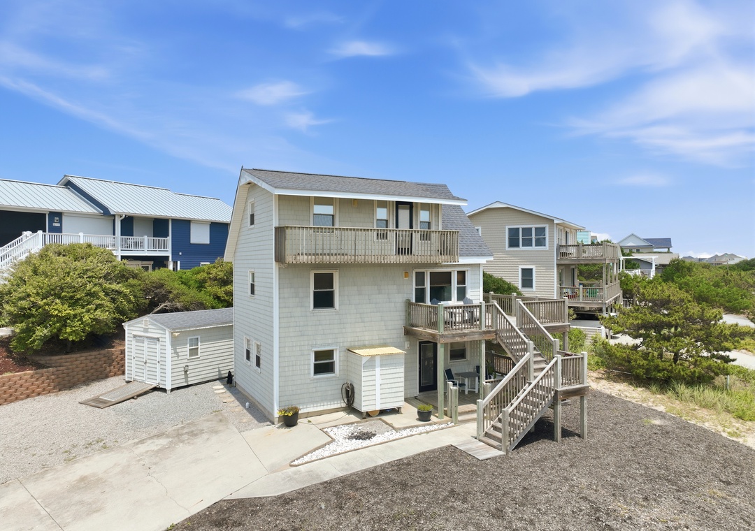 Dolphin Reach Up | Front Exterior