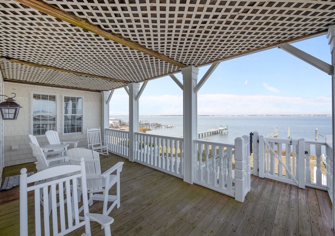 Your private waterfront deck offers stunning sea views with comfortable seating where you can relax and watch boats drift by.