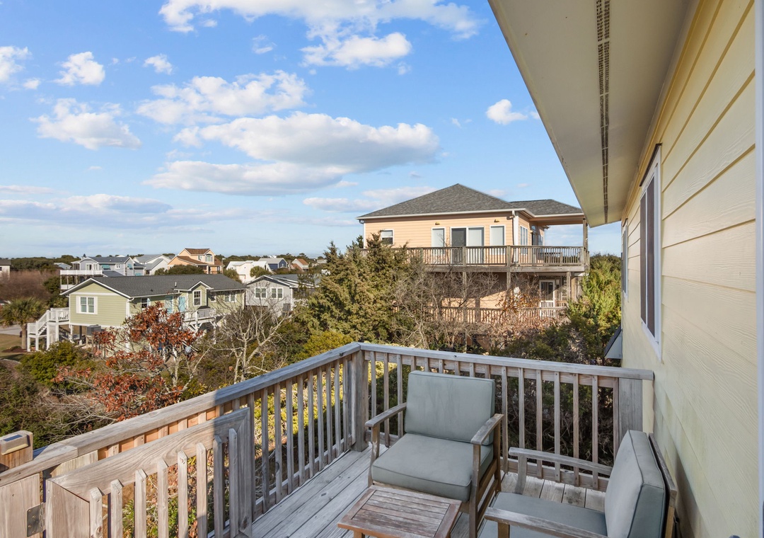 Step onto your private balcony and breathe in fresh coastal air while watching clouds drift across endless blue skies.