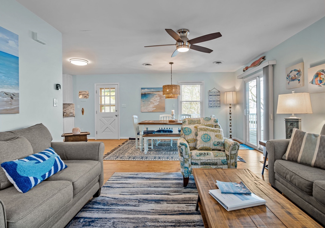 Relax in your coastal-themed living room with ocean-inspired décor, comfortable seating, and calming blue hues creating the perfect seaside retreat.