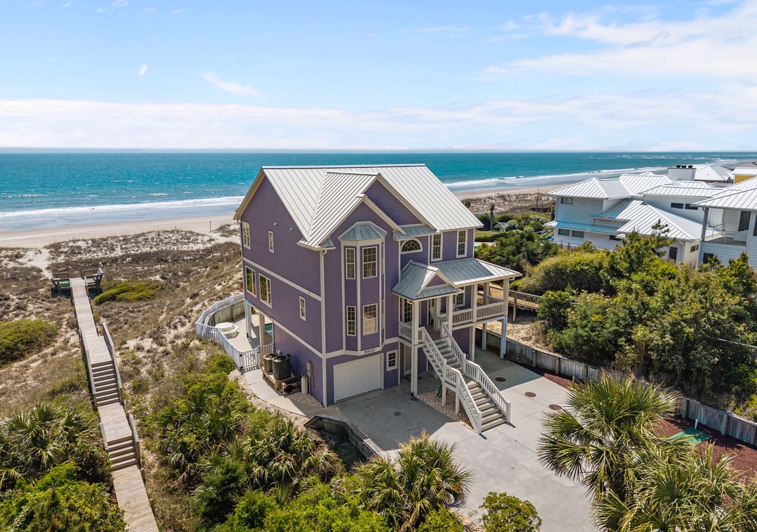 Stunning beachfront property with direct beach access and panoramic ocean views in a peaceful coastal setting.