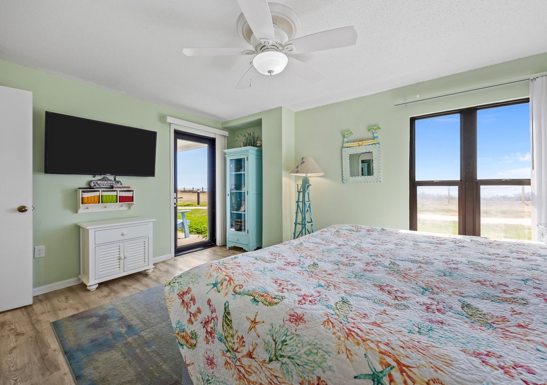 Wake up to ocean views in your peaceful bedroom, where soft coastal colors and comfortable furnishings create the perfect seaside retreat.
