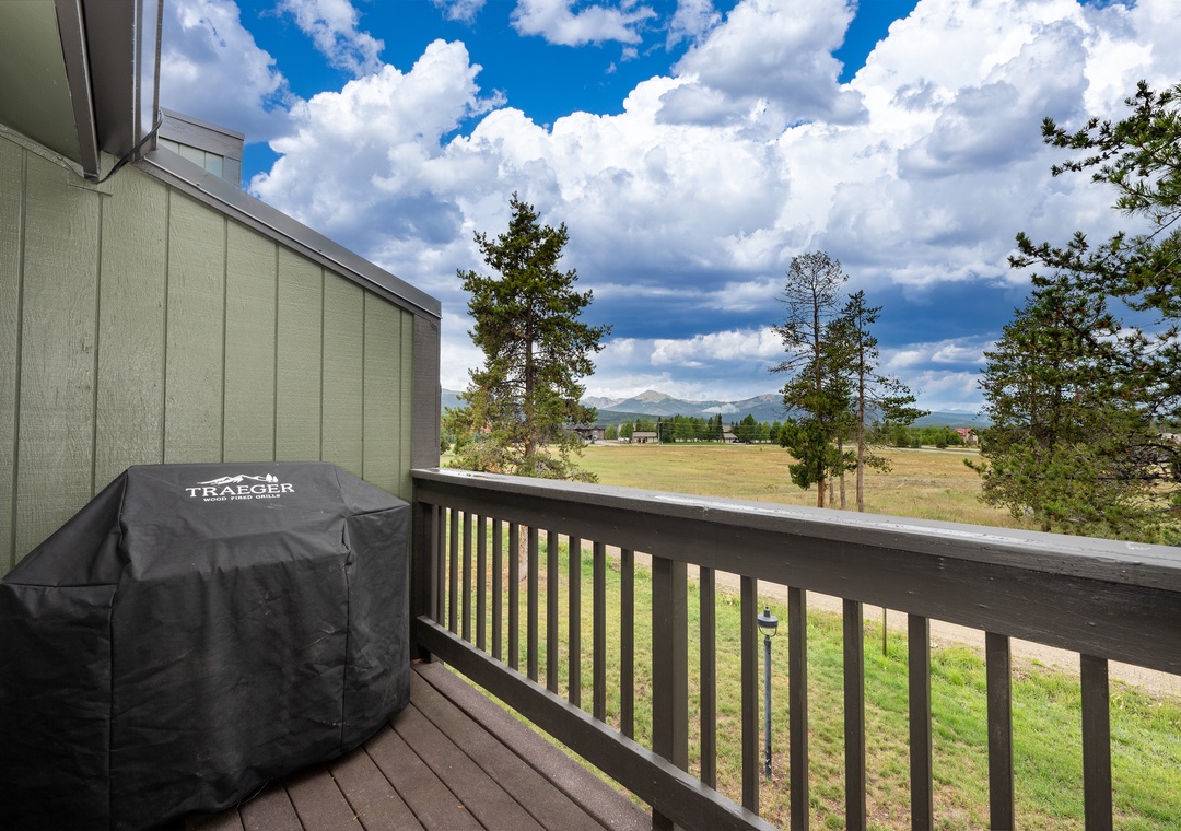 Scenic mountain views from your private balcony, complete with a covered BBQ grill for outdoor cooking while surrounded by nature.