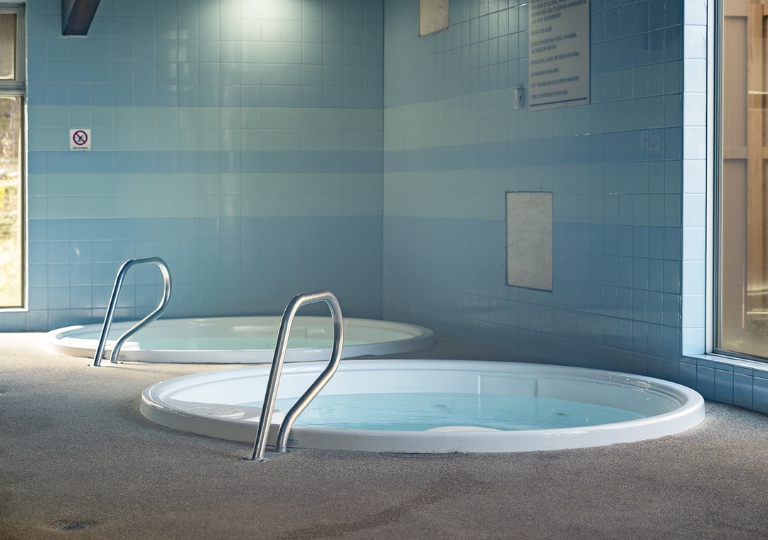 Soak your worries away in this tranquil spa area, where warm bubbling waters and soothing blue tiles create your perfect wellness retreat.