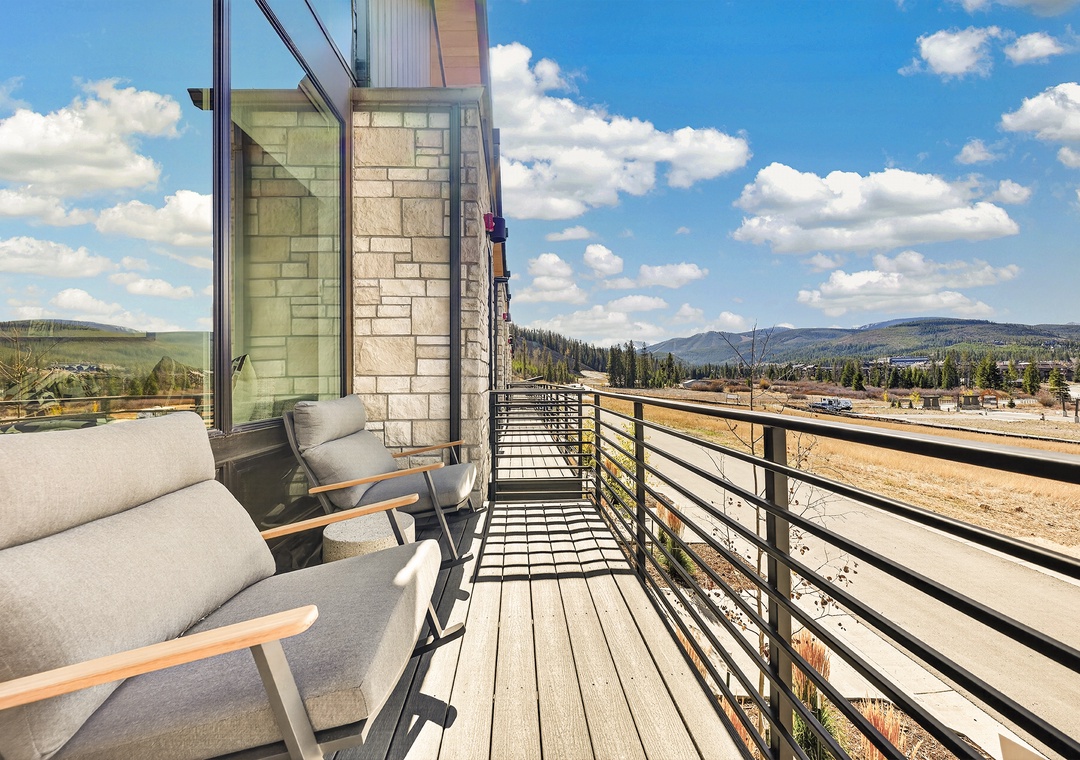 Step onto your private balcony and take in the sweeping mountain views stretching across rolling hills and open skies—a peaceful spot to savor your morning coffee or unwind as clouds drift by.