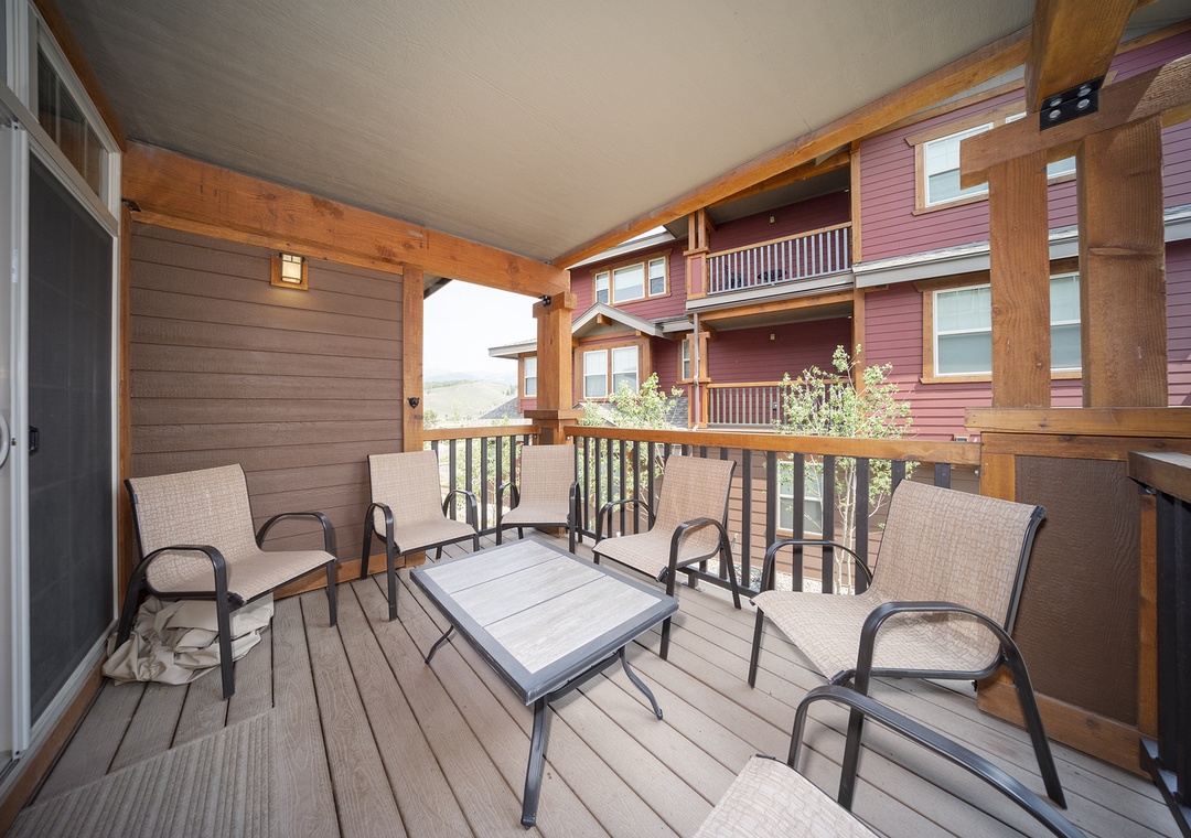 Unwind on your private covered balcony with comfortable seating for four, perfect for morning coffee or evening conversations.