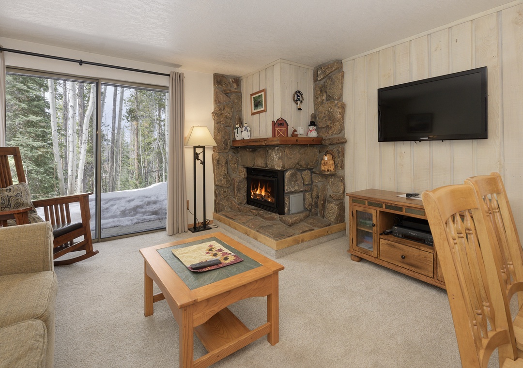 Cozy up by your crackling stone fireplace while snow blankets the forest outside your windows—mountain comfort at its finest.