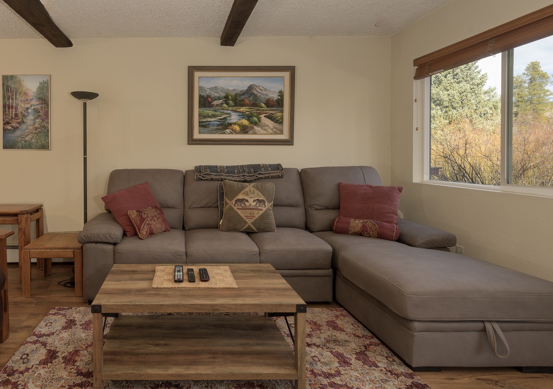 Sink into plush leather seating while autumn views frame your peaceful retreat through panoramic windows.