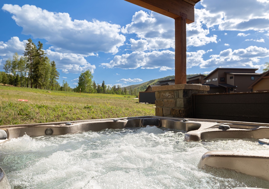 Slip into your private hot tub and soak beneath wide-open mountain skies, where gentle breezes and endless views make every moment feel like a retreat from the everyday.