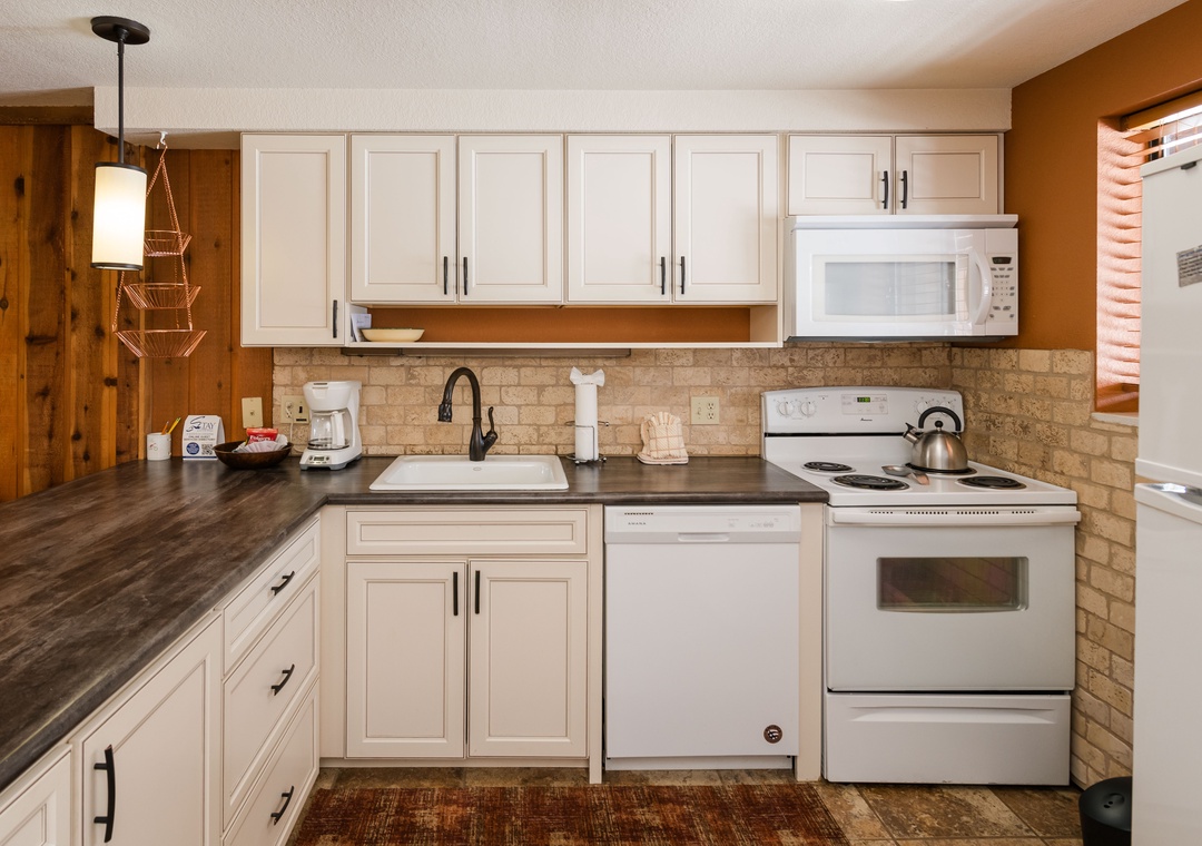 Your fully equipped kitchen features modern appliances, ample counter space, and everything you need to prepare meals during your stay.