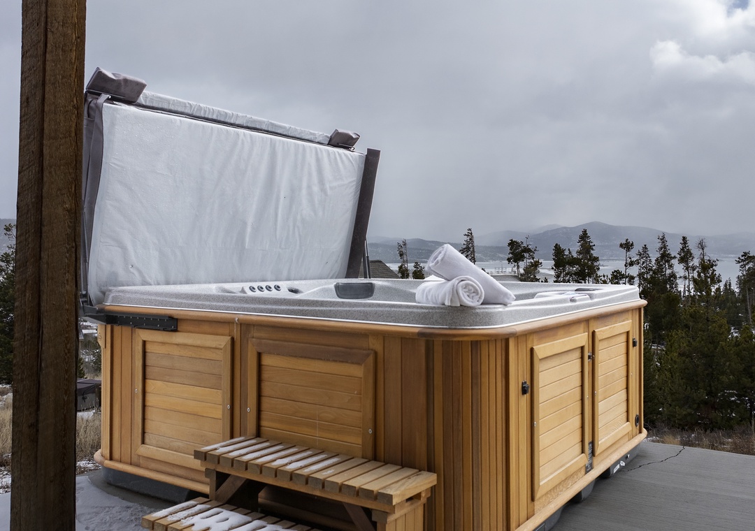 Soak your worries away in this private hot tub at 224 GCR 4034 , complete with fluffy towels and stunning mountain views for the ultimate relaxation.