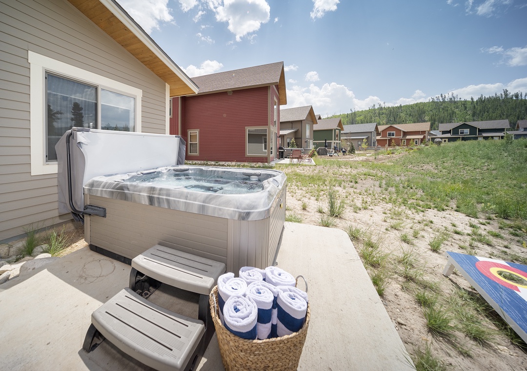 Relax in your private hot tub with fresh towels provided, surrounded by mountain views and peaceful neighborhood charm.