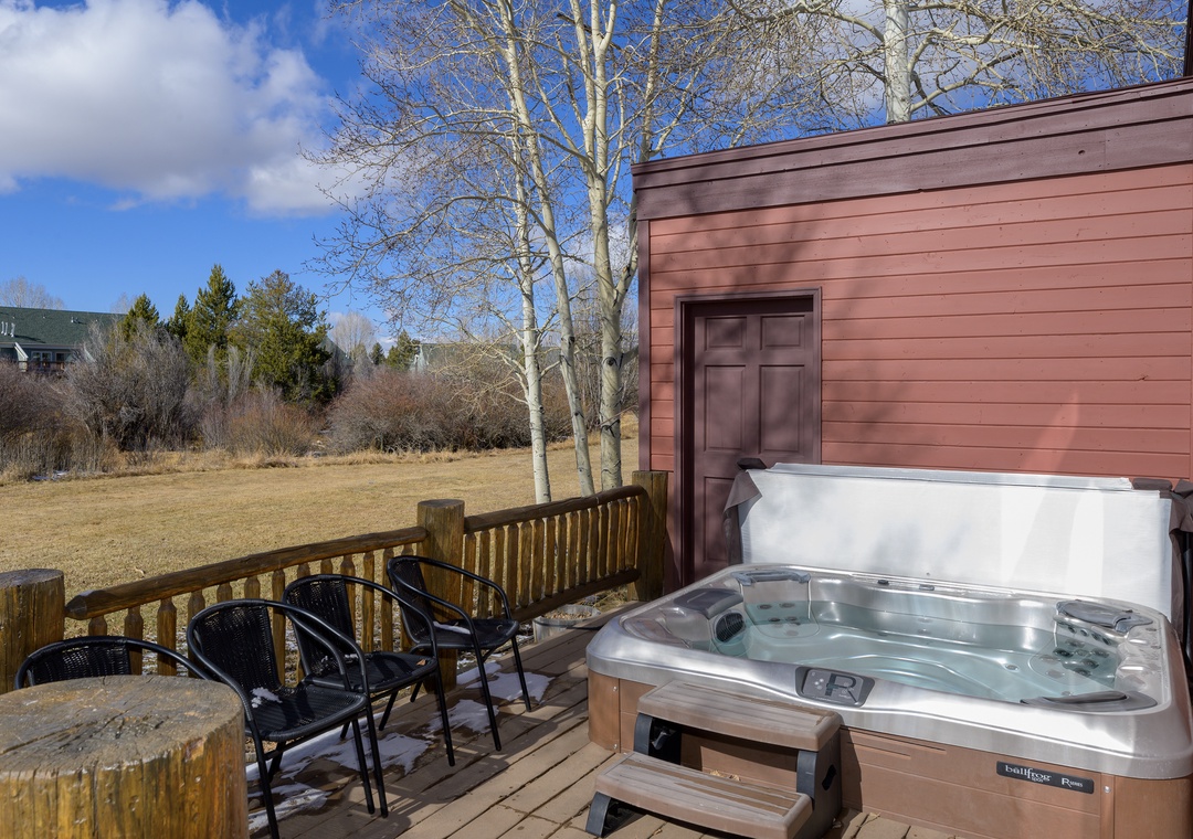 Soak in your private hot tub while mountain views stretch before you, creating the perfect backdrop for relaxation.