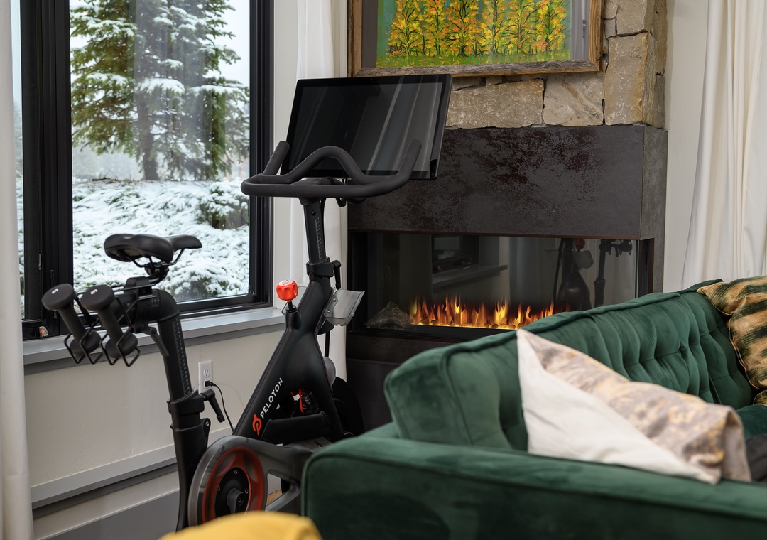 Stay active while enjoying cozy comfort by your fireplace, with winter views creating the perfect retreat backdrop.