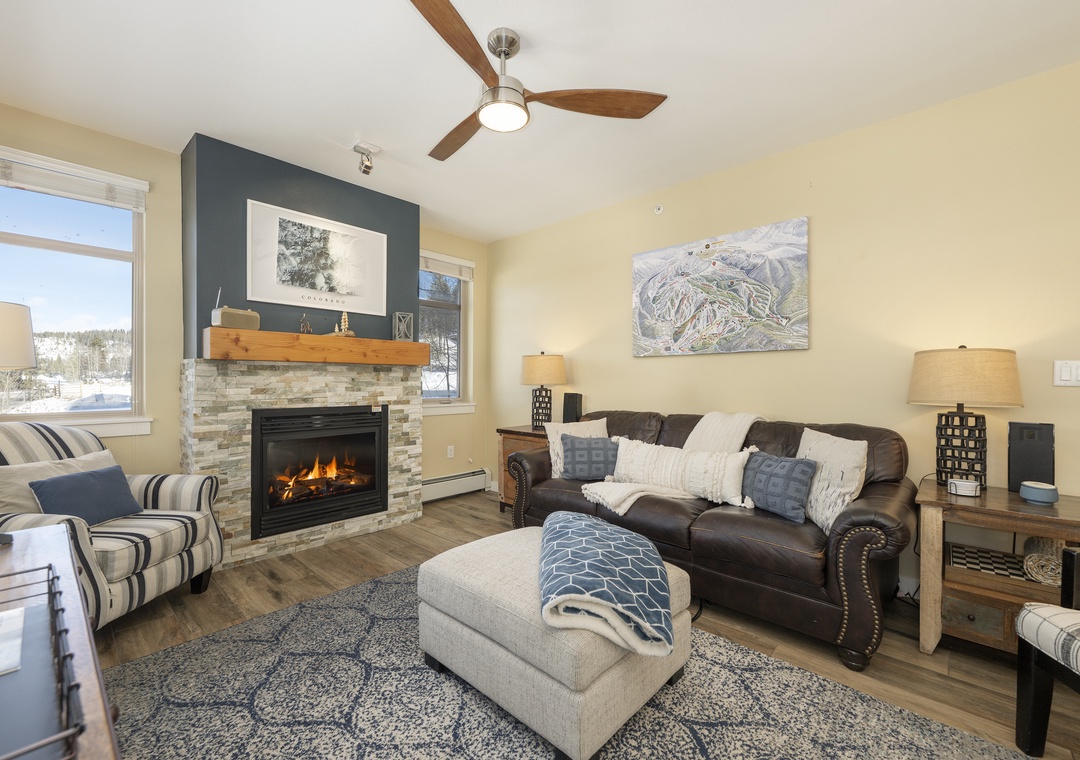Cozy up by your crackling fireplace while snow falls outside - your perfect mountain retreat awaits with leather seating and ski trail maps.