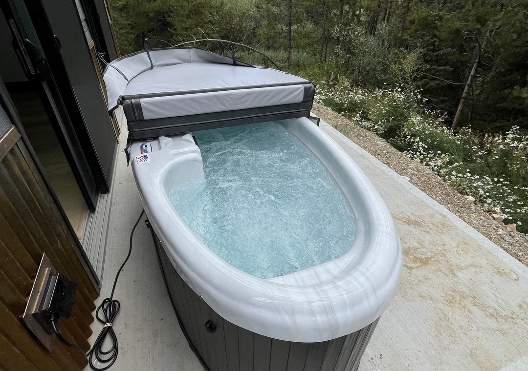 Soak away your cares in your private hot tub surrounded by forest greenery and mountain air.