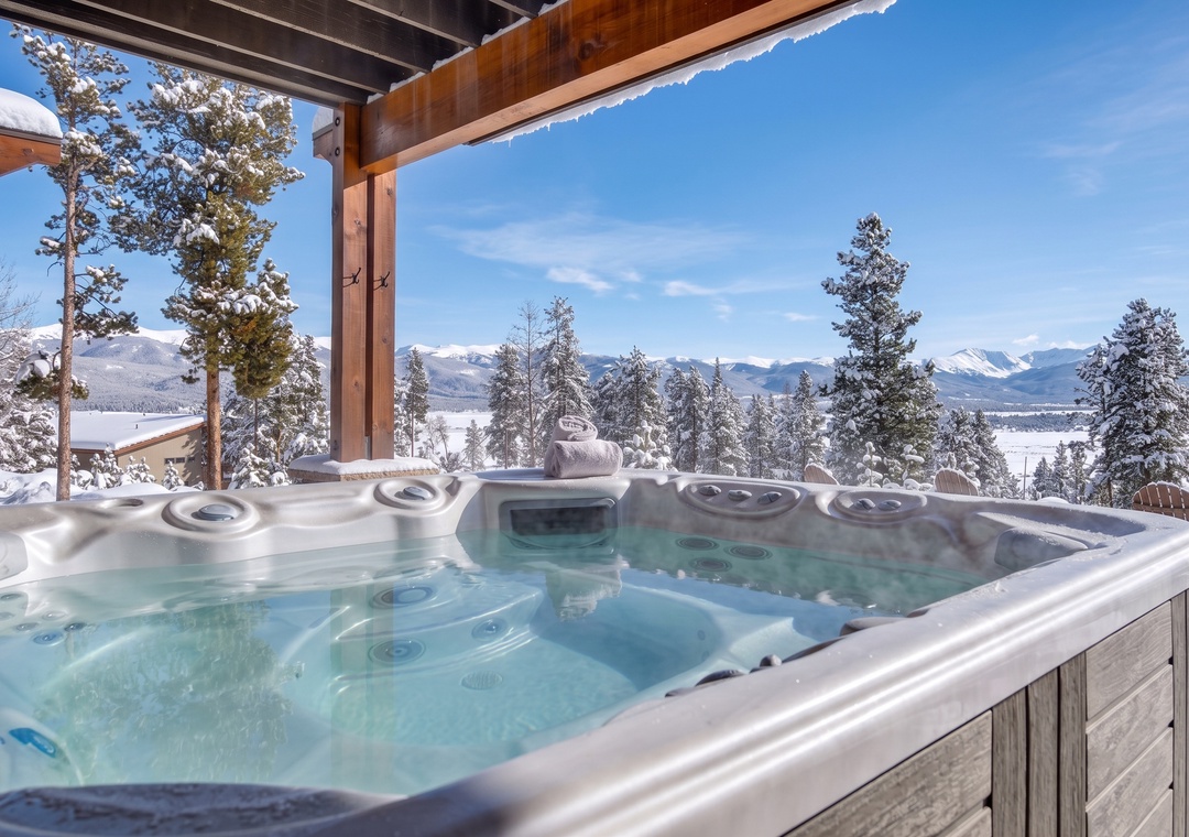 Soak in the hot tub and take in sweeping mountain and valley views. This covered outdoor spot is perfect for relaxing after a day of adventure.
