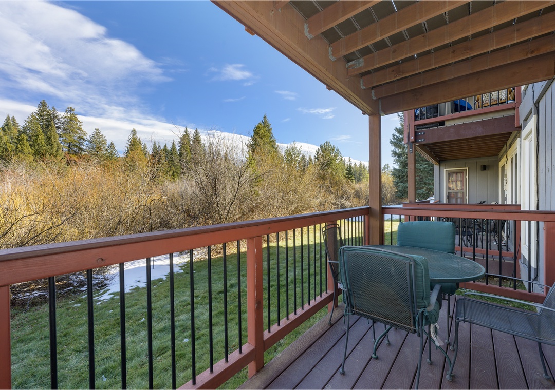 Enjoy your morning coffee on this peaceful balcony, surrounded by forest views and mountain vistas that stretch endlessly before you.
