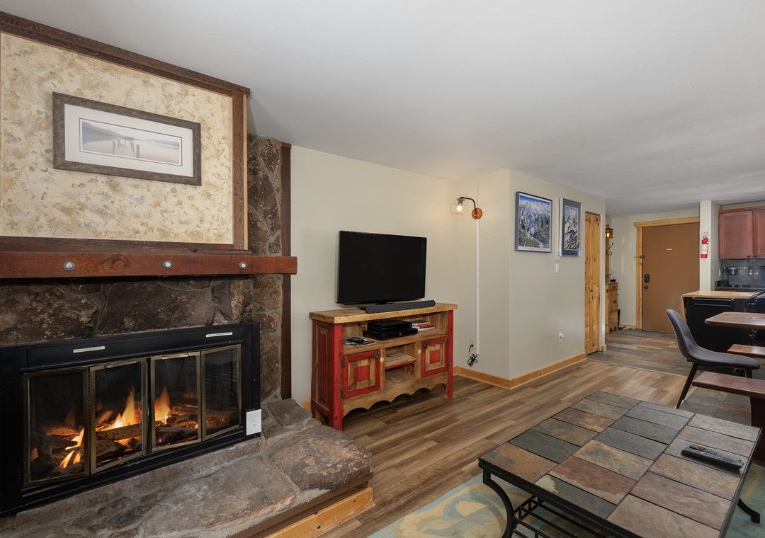 Cozy up by your crackling fireplace with mountain views and modern amenities at your fingertips.