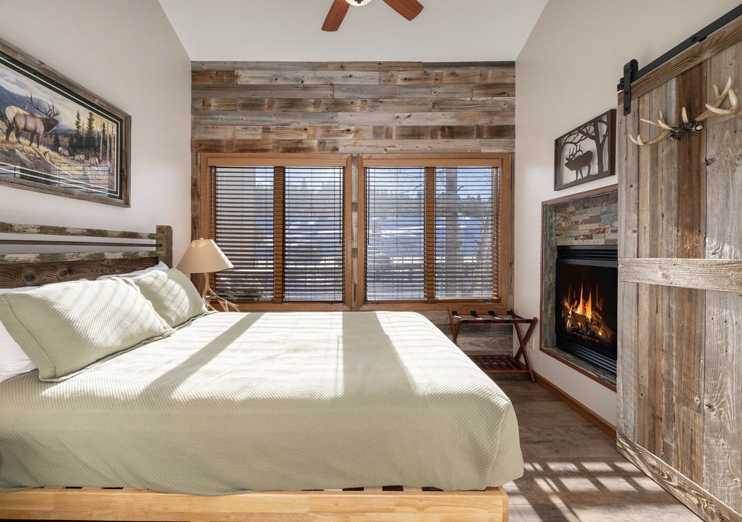 Sink into rustic luxury at Mountainside B-20 with your cozy fireplace crackling nearby and natural light streaming through your windows.