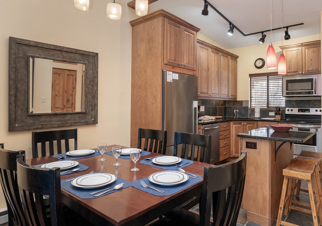 Gather around your elegant dining table for memorable meals, while the fully equipped kitchen invites you to create culinary adventures together.