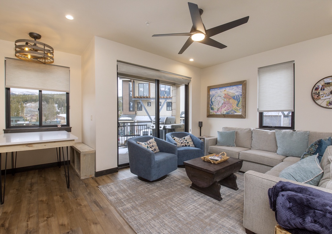 Unwind in your stylish living space with plush seating, mountain views, and modern touches that make every moment feel like home.