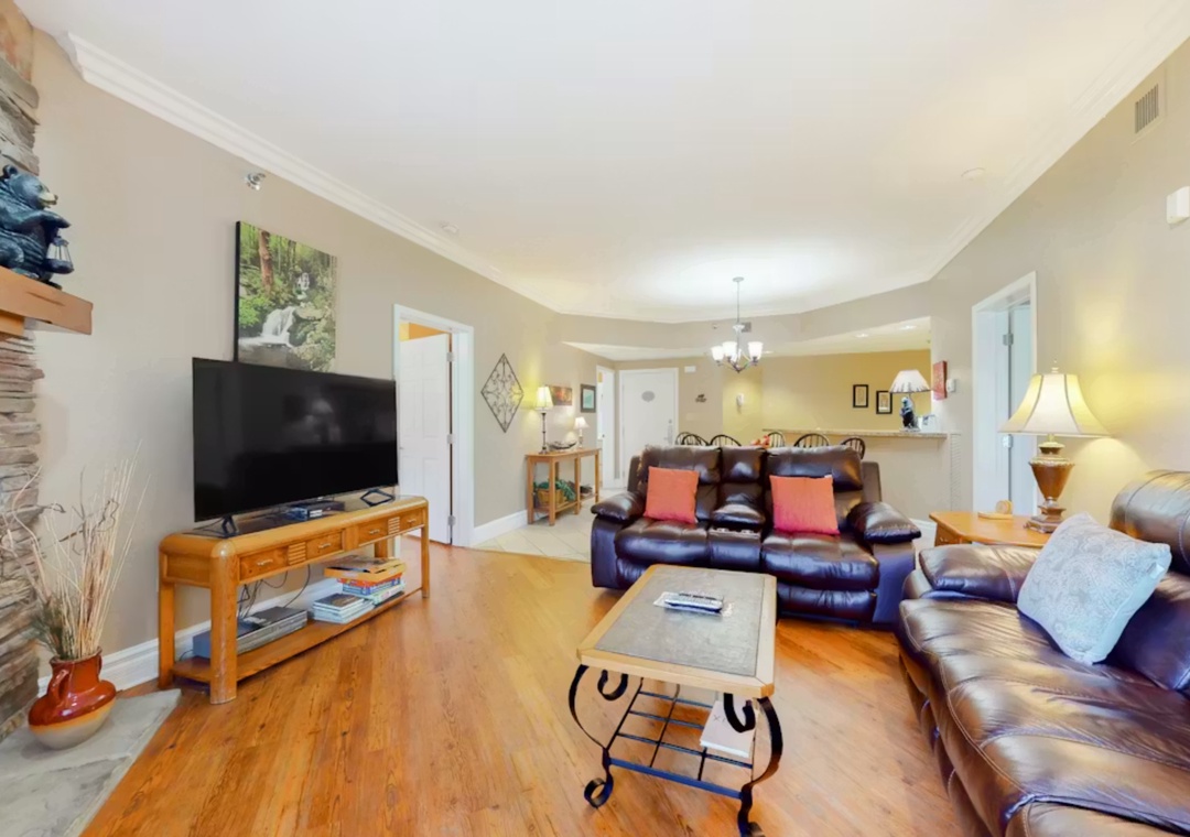 Sink into plush leather recliners as you unwind in your spacious living room, complete with a large TV for cozy movie nights.