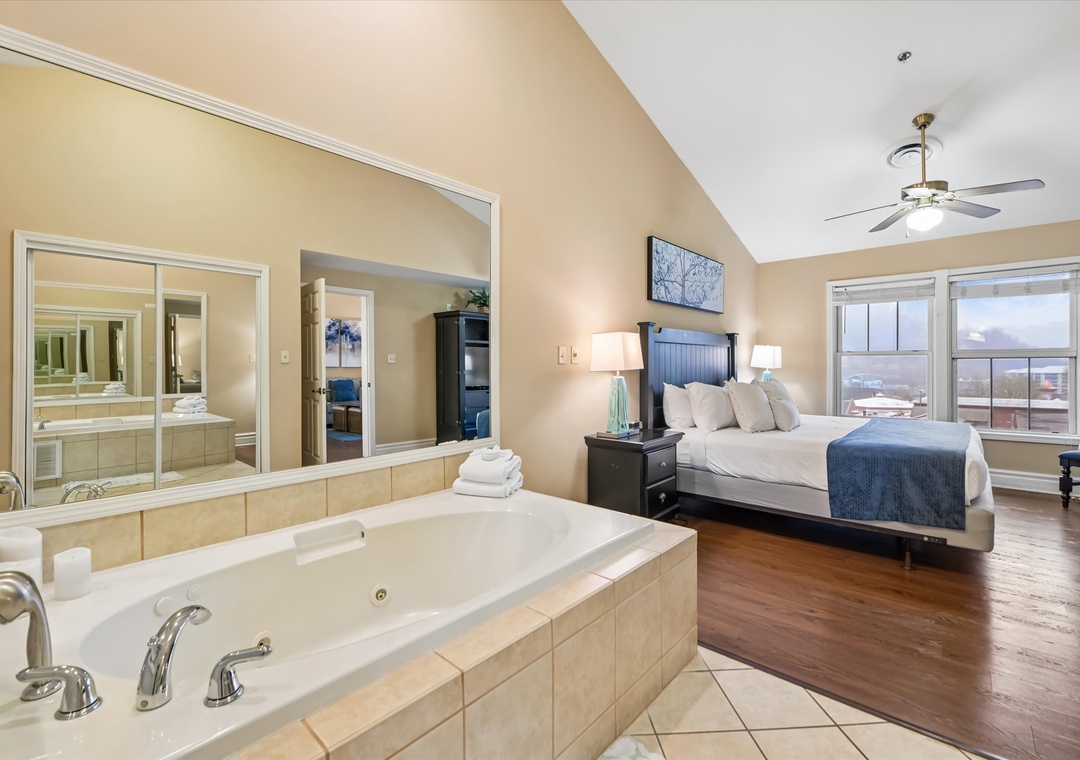Unwind in your luxurious suite where relaxation meets romance—soak in your private jetted tub while enjoying stunning city views.