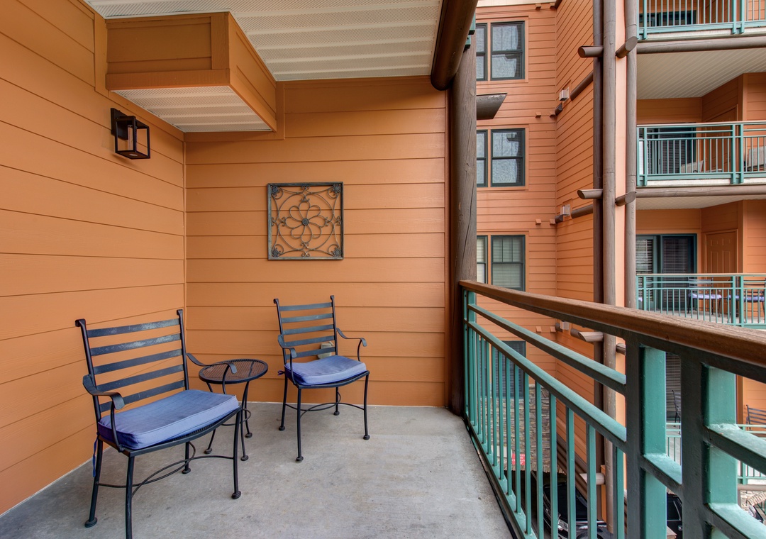 Unwind on your private balcony with comfortable seating where you can enjoy morning coffee or evening relaxation.
