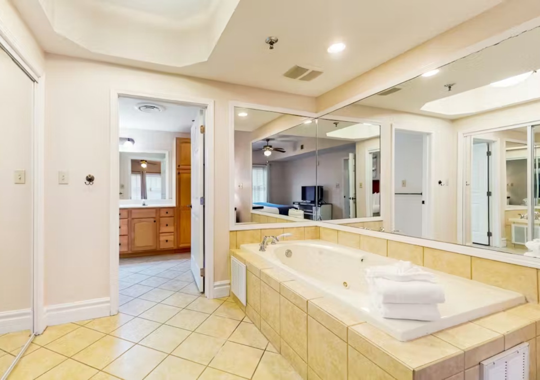 Indulge in your private spa retreat with a spacious soaking tub where you can unwind after exploring the area.