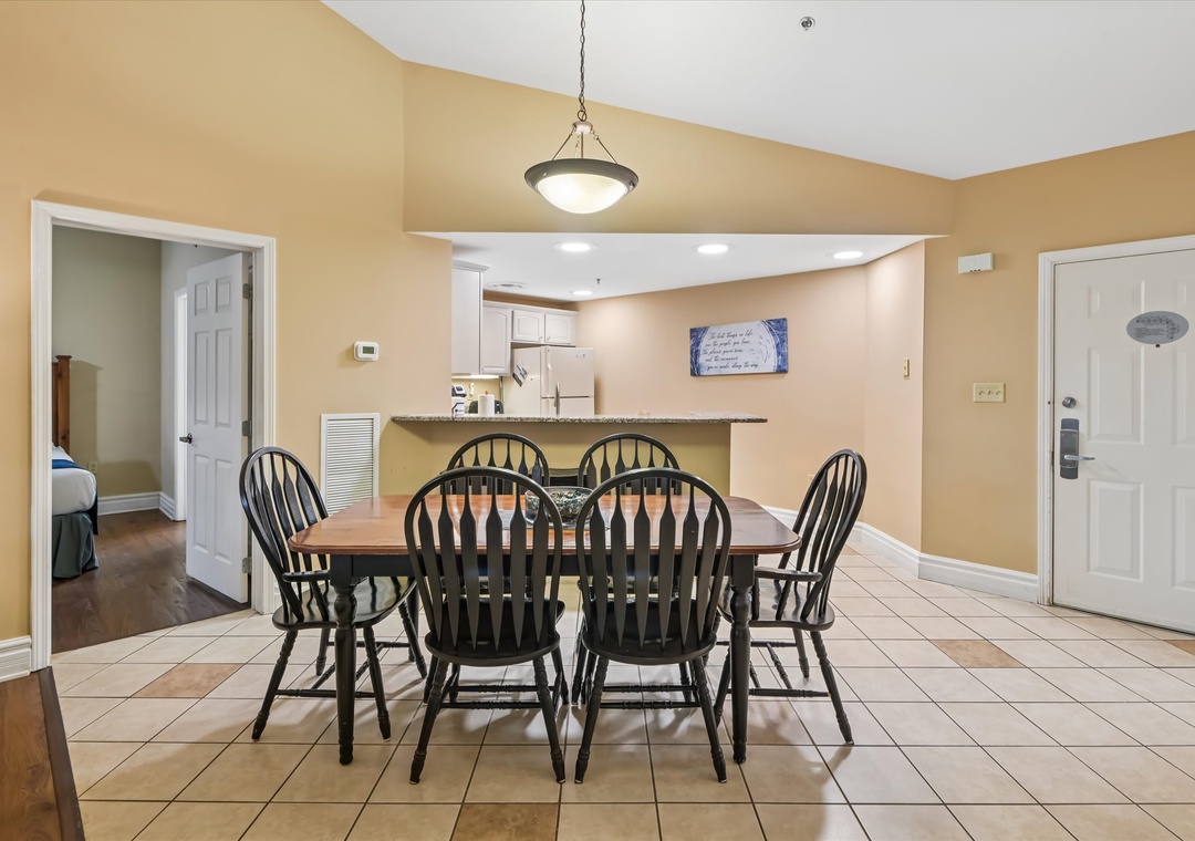 Gather around this welcoming dining table where your group can share meals and make memories in the heart of your home away from home.