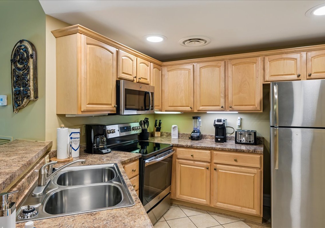 Your fully equipped kitchen features granite countertops, stainless steel appliances, and everything you need to create delicious meals during your stay.