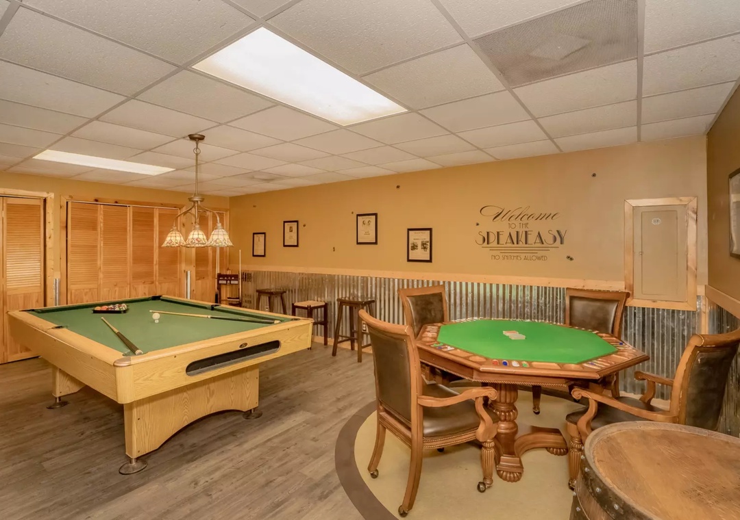 Your private speakeasy awaits with a pool table and card table for endless evening entertainment.