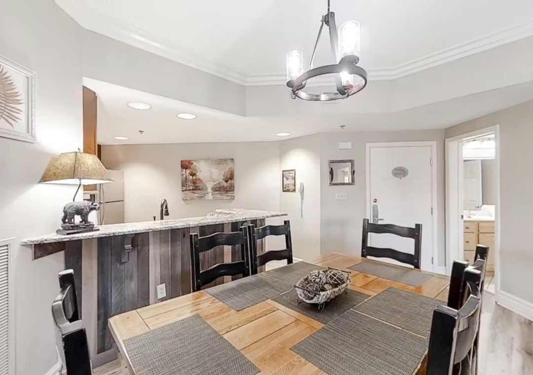 Your open dining space flows beautifully into the modern kitchen, perfect for memorable meals and conversations.