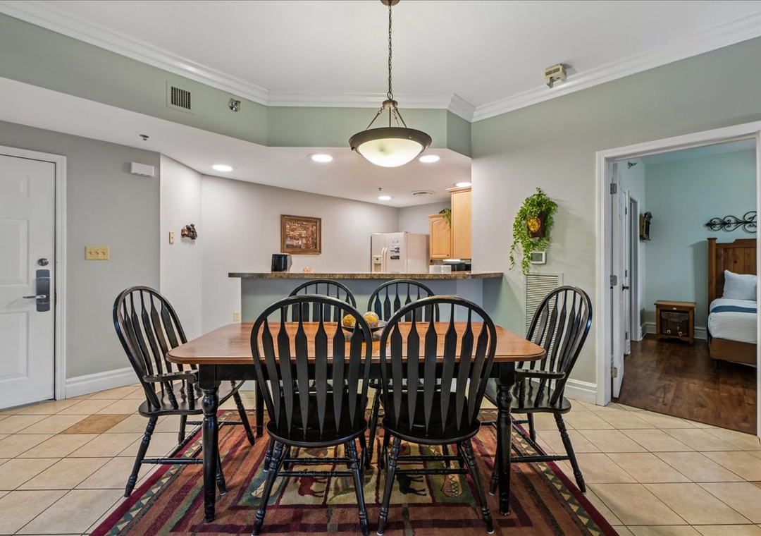 Gather around your spacious dining table where morning coffee and evening meals become cherished memories with loved ones.