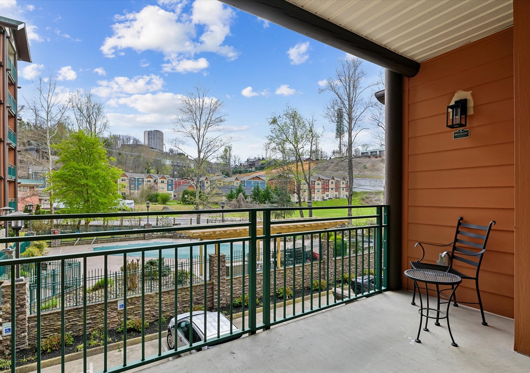 Step out onto your private balcony and soak in panoramic views of the vibrant cityscape and lush green spaces below.