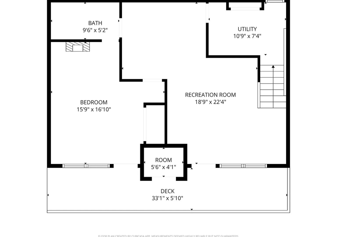 This floor plan shows a spacious layout with a bedroom, recreation room, utility space, bathroom, and expansive deck—perfect for visualizing your stay.