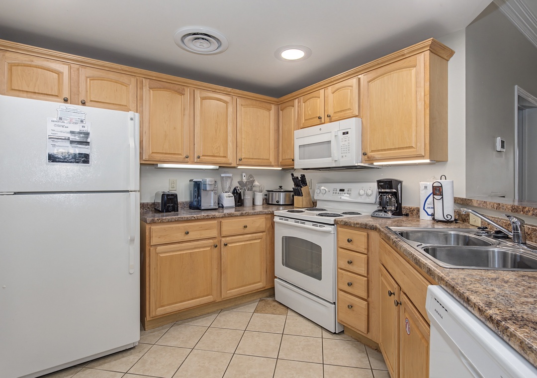 Your fully-equipped kitchen features granite counters, maple cabinets, and everything you need to create memorable meals during your stay.