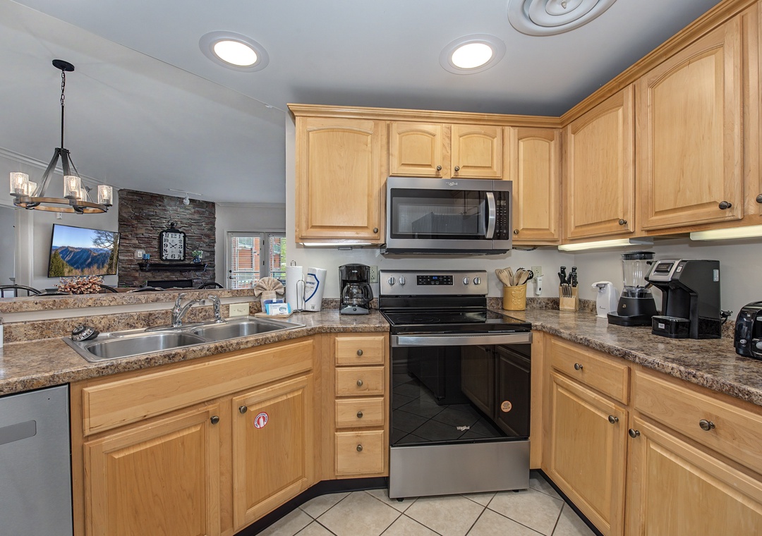 Your fully equipped kitchen awaits with granite counters, stainless appliances, and everything you need to create memorable meals during your stay.