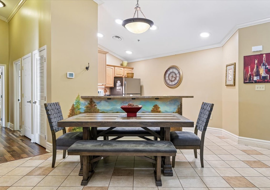 Gather around this stunning dining table where your meals become memorable moments, surrounded by warm décor and thoughtful touches.