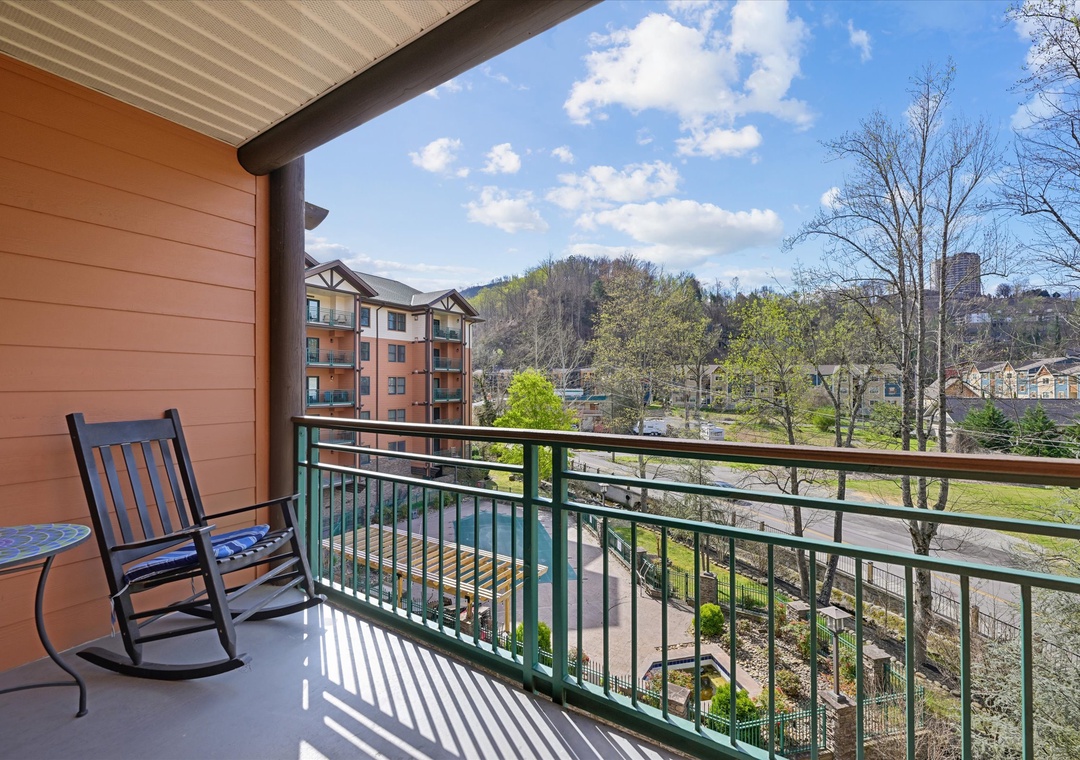 Step onto your private balcony and breathe in the fresh mountain air while rocking gently in your chair, overlooking peaceful neighborhoods.
