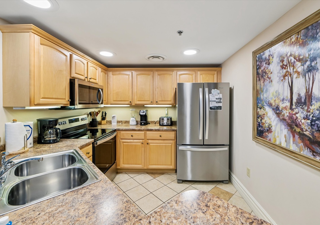 Your fully equipped kitchen features modern appliances and granite countertops, perfect for preparing meals during your stay.