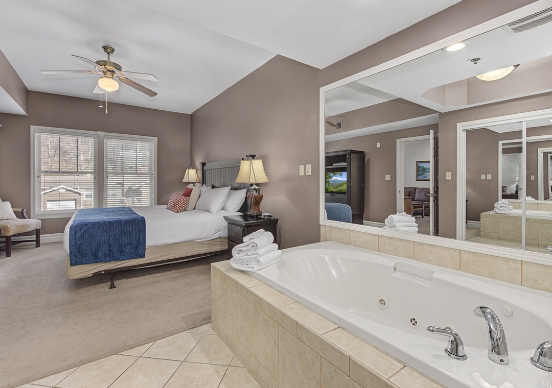 Unwind in your luxurious suite where a jetted tub awaits your evening soak while your comfortable bed promises sweet dreams.