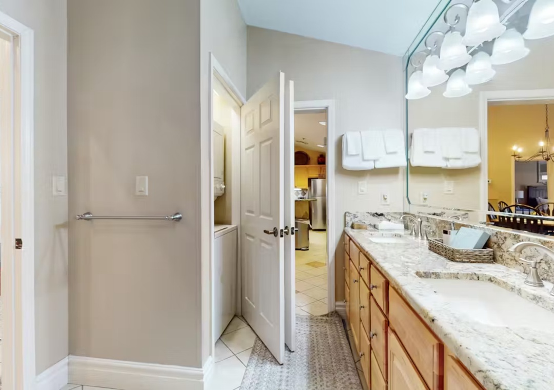 Your spacious master bathroom features elegant granite countertops, dual vanities, and premium fixtures for a luxurious morning routine.