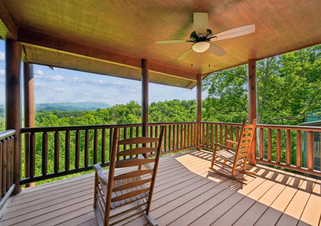 Sway gently in your rocking chair while taking in sweeping mountain vistas and lush green forests from your private covered deck.