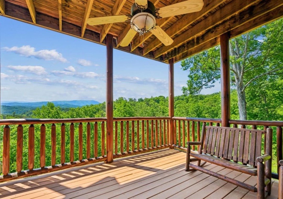 Relax on your private deck with sweeping mountain views. Breathe in the fresh air and feel the breeze as you unwind with nature's beauty stretching endlessly before you.