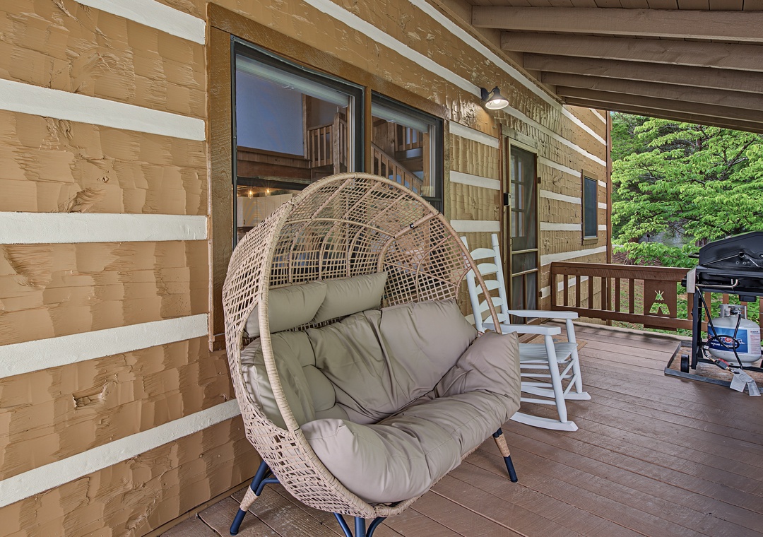Settle into your private egg chair with morning coffee, gaze at lush greenery, and let the quiet surround you. The perfect spot to unwind or fire up the grill.
