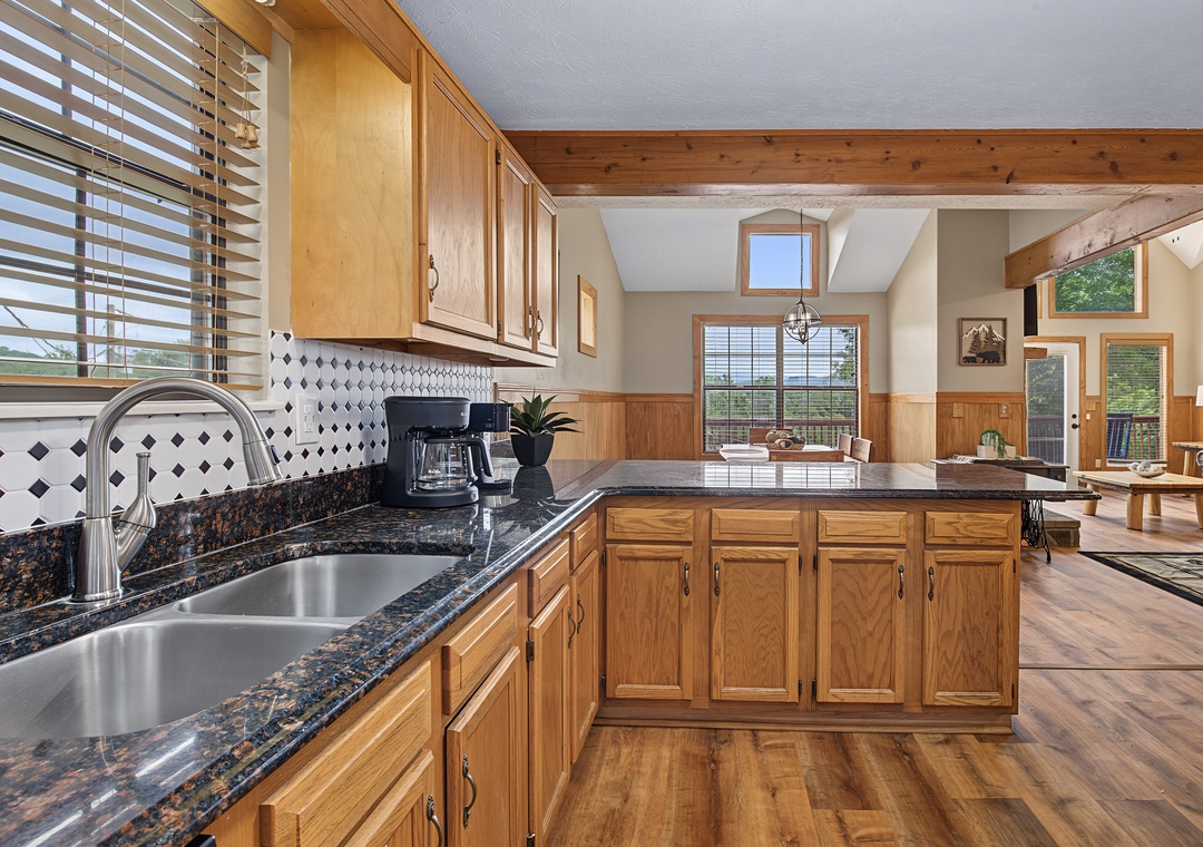 Step into your fully equipped kitchen with granite counters, ample cabinet space, and an open layout that flows into the bright living area—perfect for gathering with loved ones while you cook.